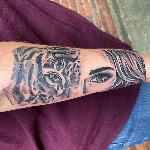 Meaningful half tiger half woman face tattoo symbolizing admiration