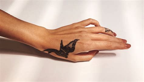 Star constellation hand tattoo