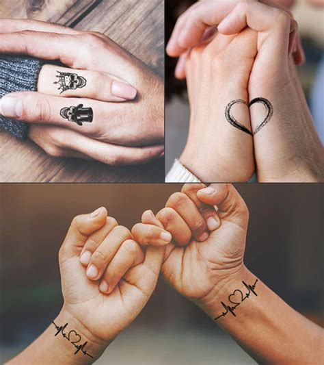 Matching couple hand tattoos with heart symbols