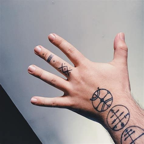 Meaningful hand tattoo symbols