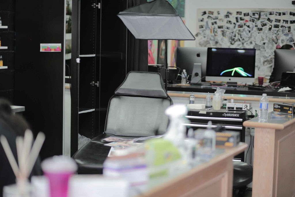 Tattoo artist preparing for a tattoo session