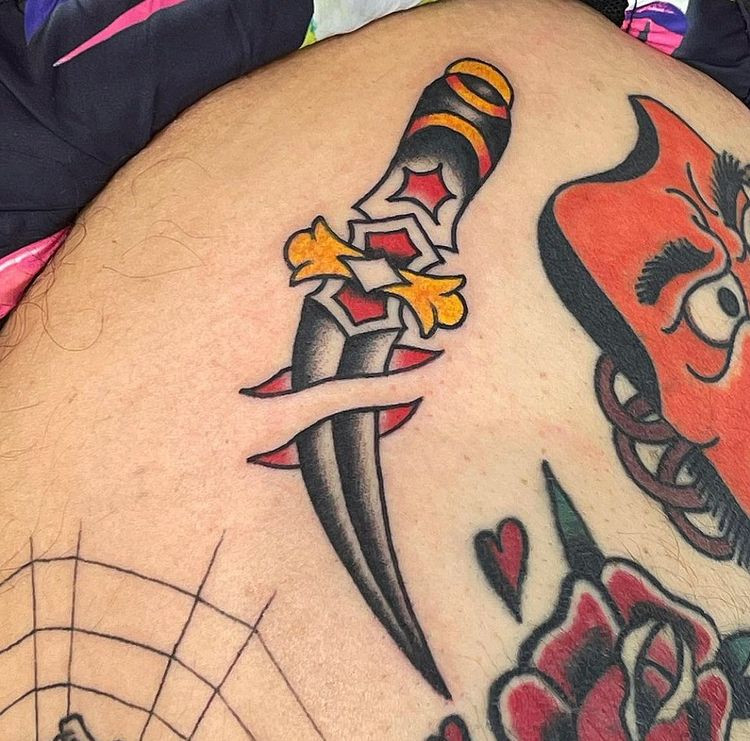 badass dagger tattoo with rose and banner