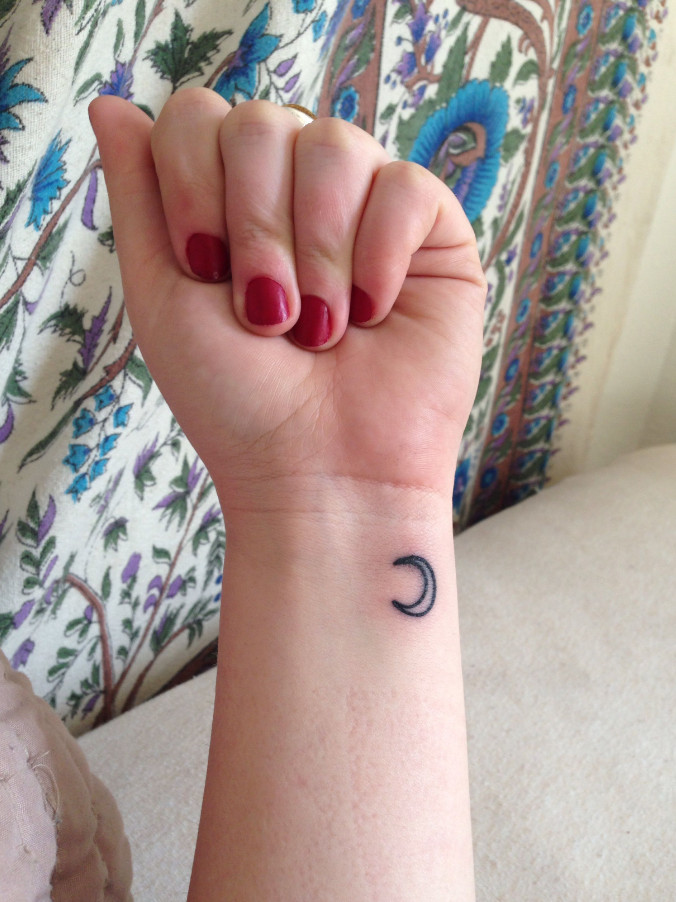 Crescent moon phases wrist tattoo for women