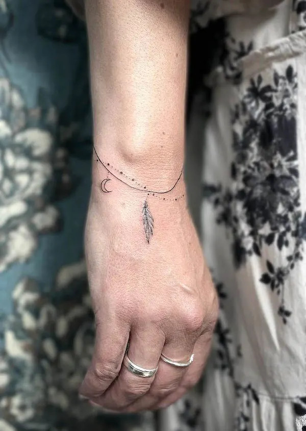 Simple wave wrist tattoo representing peace and going with the flow