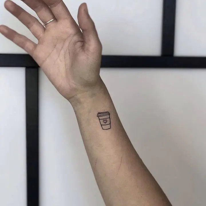 Stick and poke star wrist tattoo signifying dreams and life memories