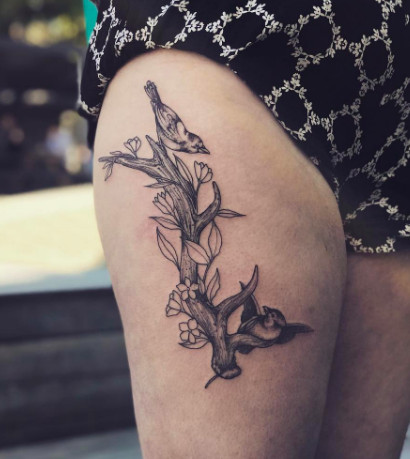 Bird and Branch Thigh Tattoo