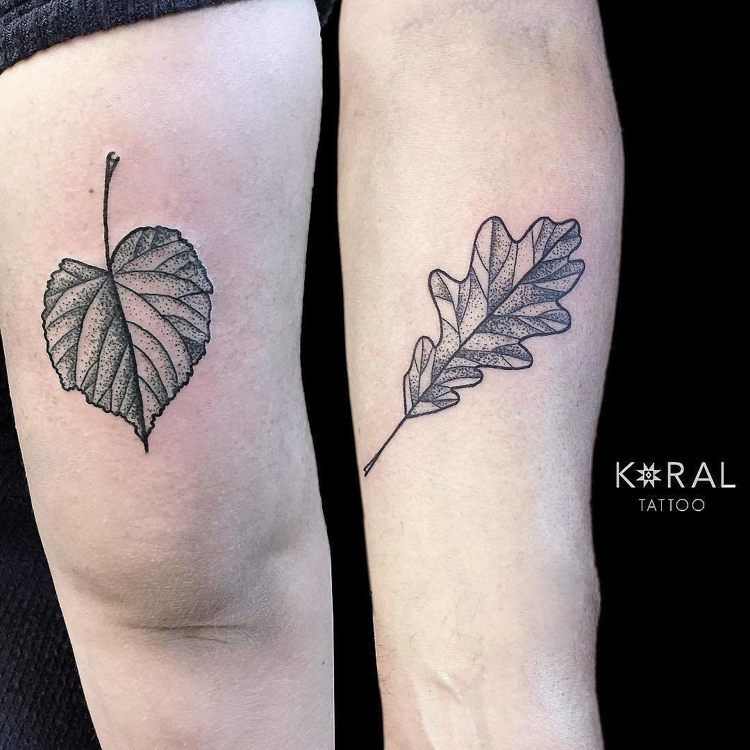 Father and daughter showcasing forearm tattoos of leaf designs, a linden leaf and an oak leaf, representing complementary qualities and a nature-inspired connection.