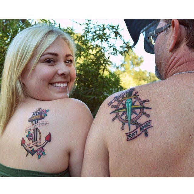 Father and daughter showcasing forearm tattoos of sailing-themed designs with a quote &quot;Guide me through the waters… We shall never drift apart,&quot; symbolizing shared adventures and a strong bond.