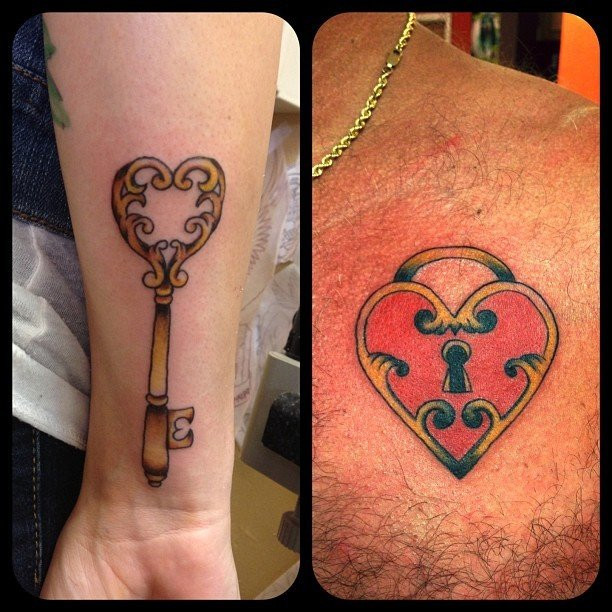 Father and daughter displaying forearm tattoos of a lock and key, symbolizing the daughter holding the key to her father's heart and their inseparable bond.