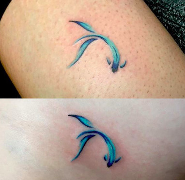 Watercolor style fish tattoos, symbolizing going with the flow and shared experiences