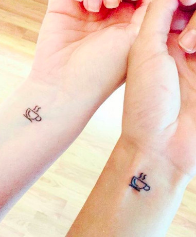 Coffee cup tattoos with steam lines, perfect for friends who bond over coffee dates