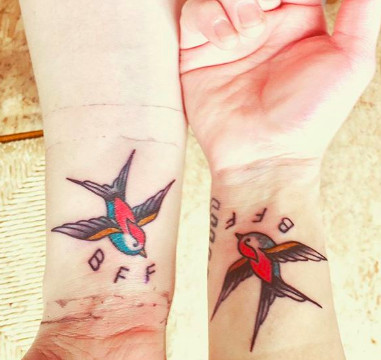 Traditional sparrow tattoos with &quot;BFF&quot; banner, representing loyalty and classic friendship symbolism