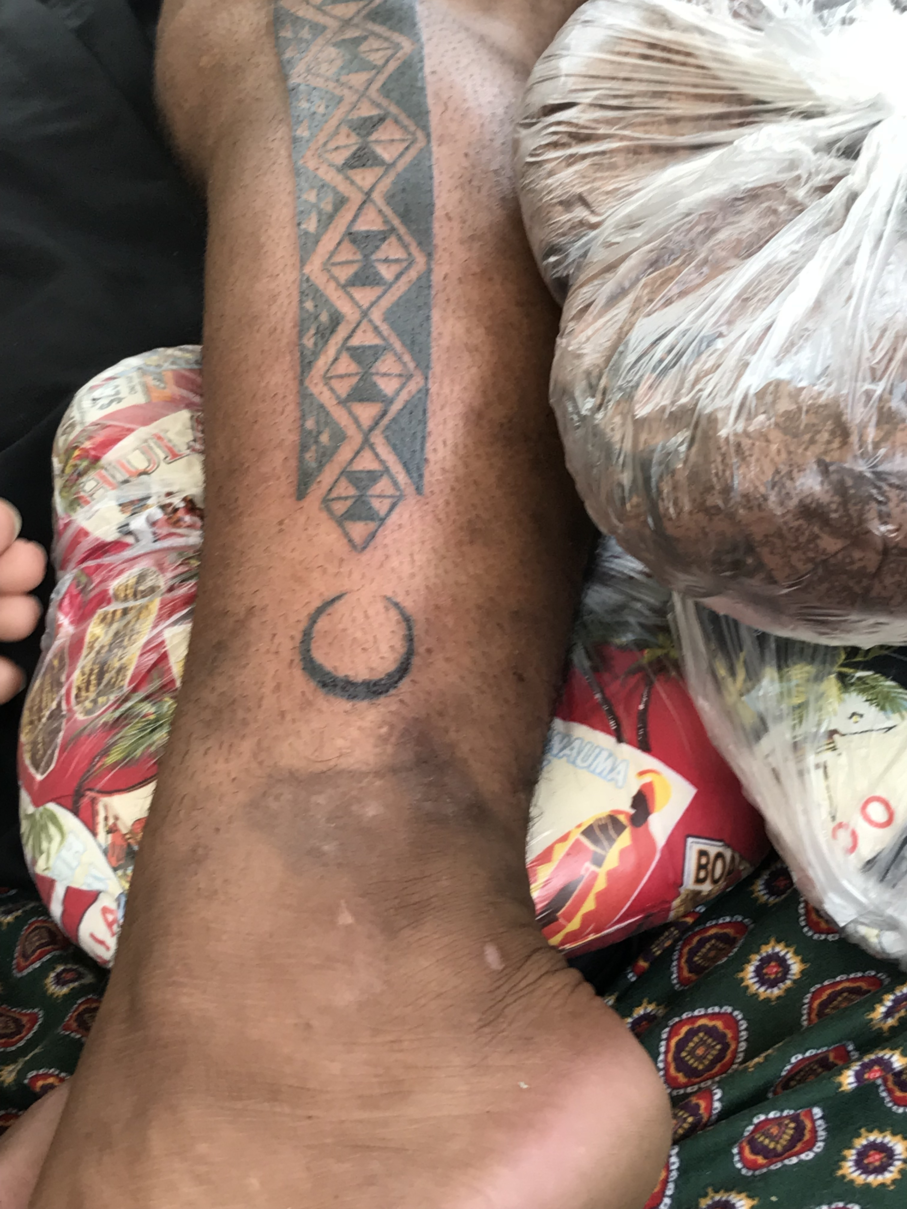 Close-up view of traditional Hawaiian tattoo tools used in kākau, highlighting the bone implements