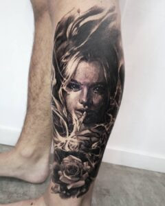 Close-up of Mish tattooing a detailed piece, highlighting placement and composition
