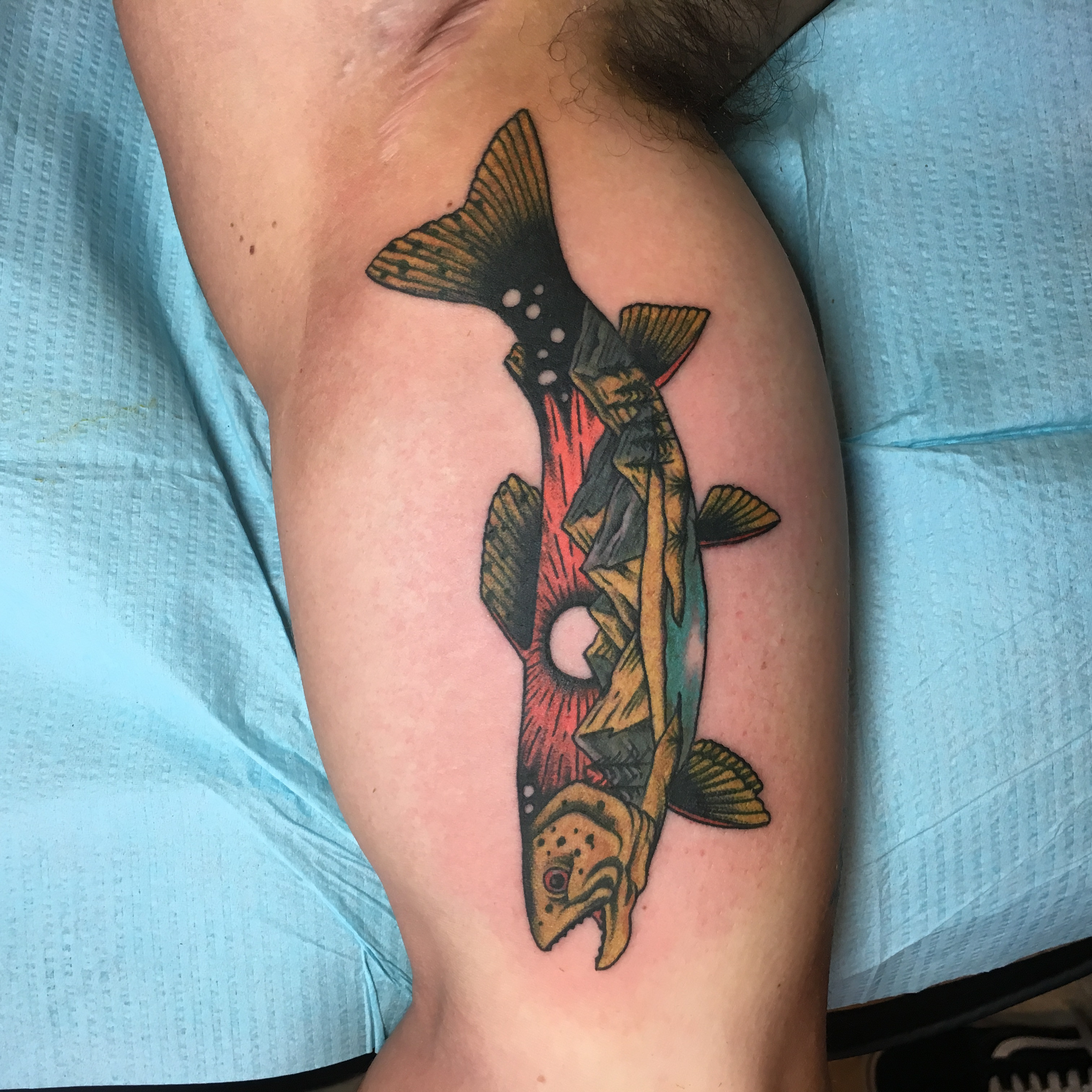 Fly fishing and tattooing lifestyle: Drew Wilson traveling and combining his passions.