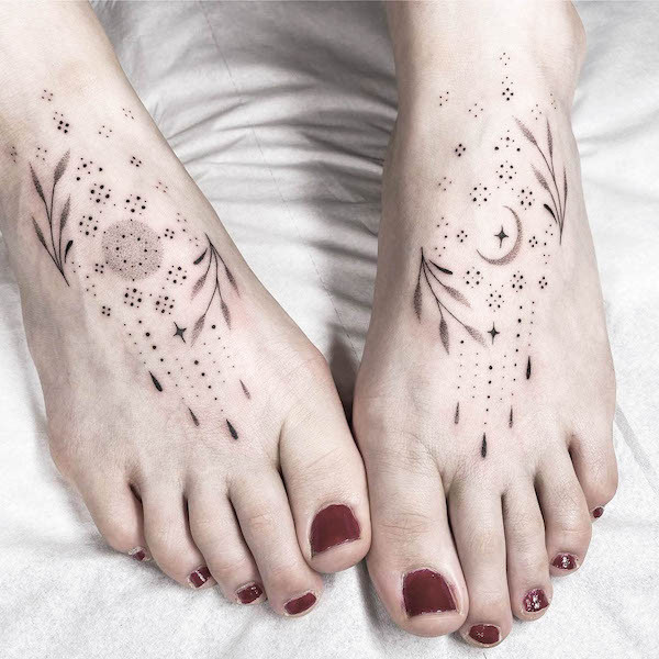 Intricate sun and moon foot tattoos, detailed celestial designs showcasing artistry and balance