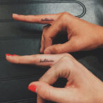 Ireland Baldwin name finger tattoo