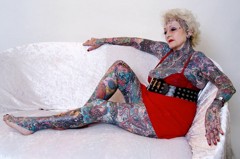 Isobel Varley, known as the world's most tattooed female pensioner, showcasing her extensive body suit.