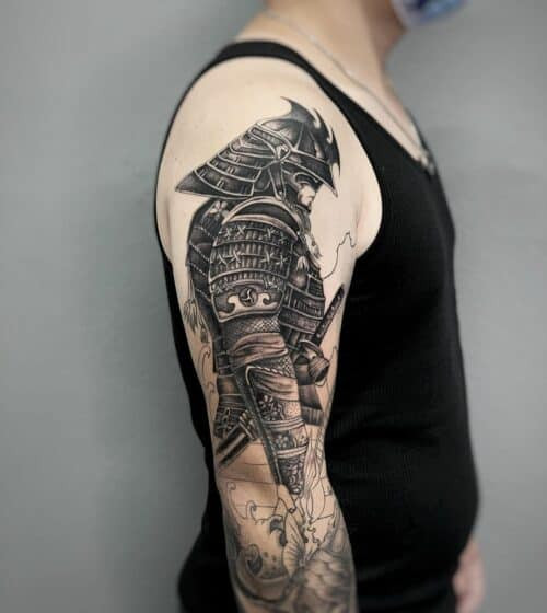 Japanese samurai tattoo in full armor with a katana sword on back
