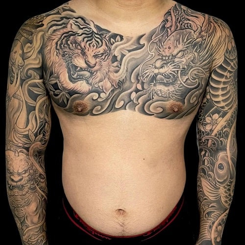 Intricate Japanese tiger tattoo inspired by samurai art