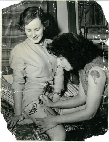 Jessie Knight, considered the UK's first professional female tattoo artist, pictured in her shop.