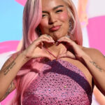 Decoding Karol G’s Tattoos: A Deep Dive into Her Ink and Meanings