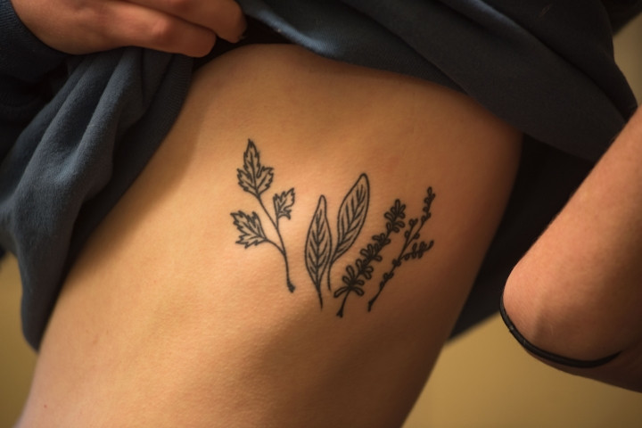 Parsley Sage Rosemary and Thyme herbs tattoo on rib cage for personal meaning and music tribute