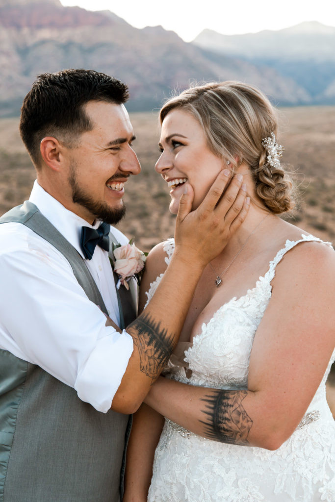 Matching mountain range tattoos with evergreen trees, symbolizing the couple's shared passion for nature and mountains.