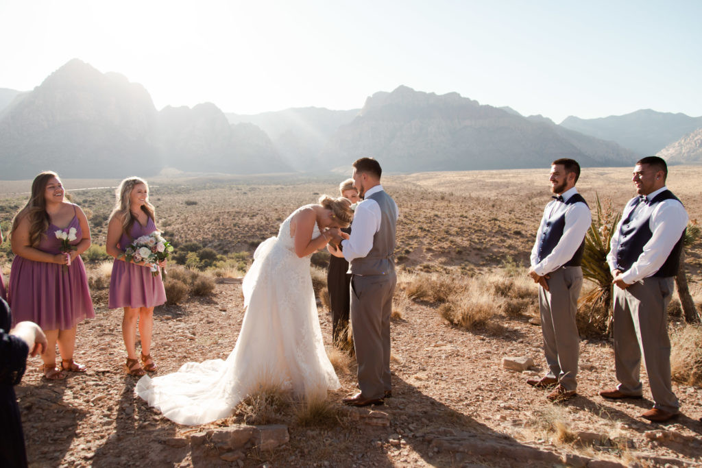 Emotional groom shedding happy tears during his elopement vows.