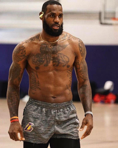 LeBron James' chest tattoo of a winged lion, symbolizing his ferocious and dominant playing style on the basketball court.