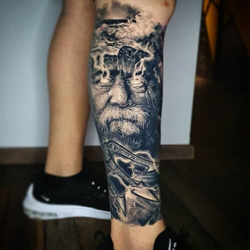 Full leg sleeve tattoo with Japanese theme on a man's leg