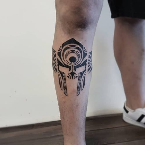 Geometric leg tattoo on a man's leg