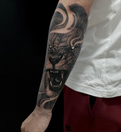 Lion Arm Tattoo, lion tattoo on upper arm, versatile placement