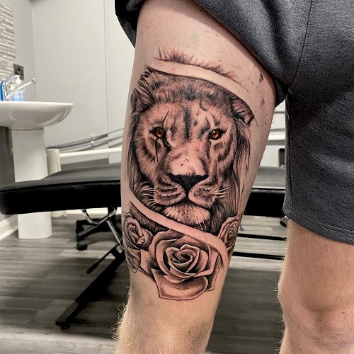 Lion Thigh Tattoo, lion tattoo on thigh, large and detailed design