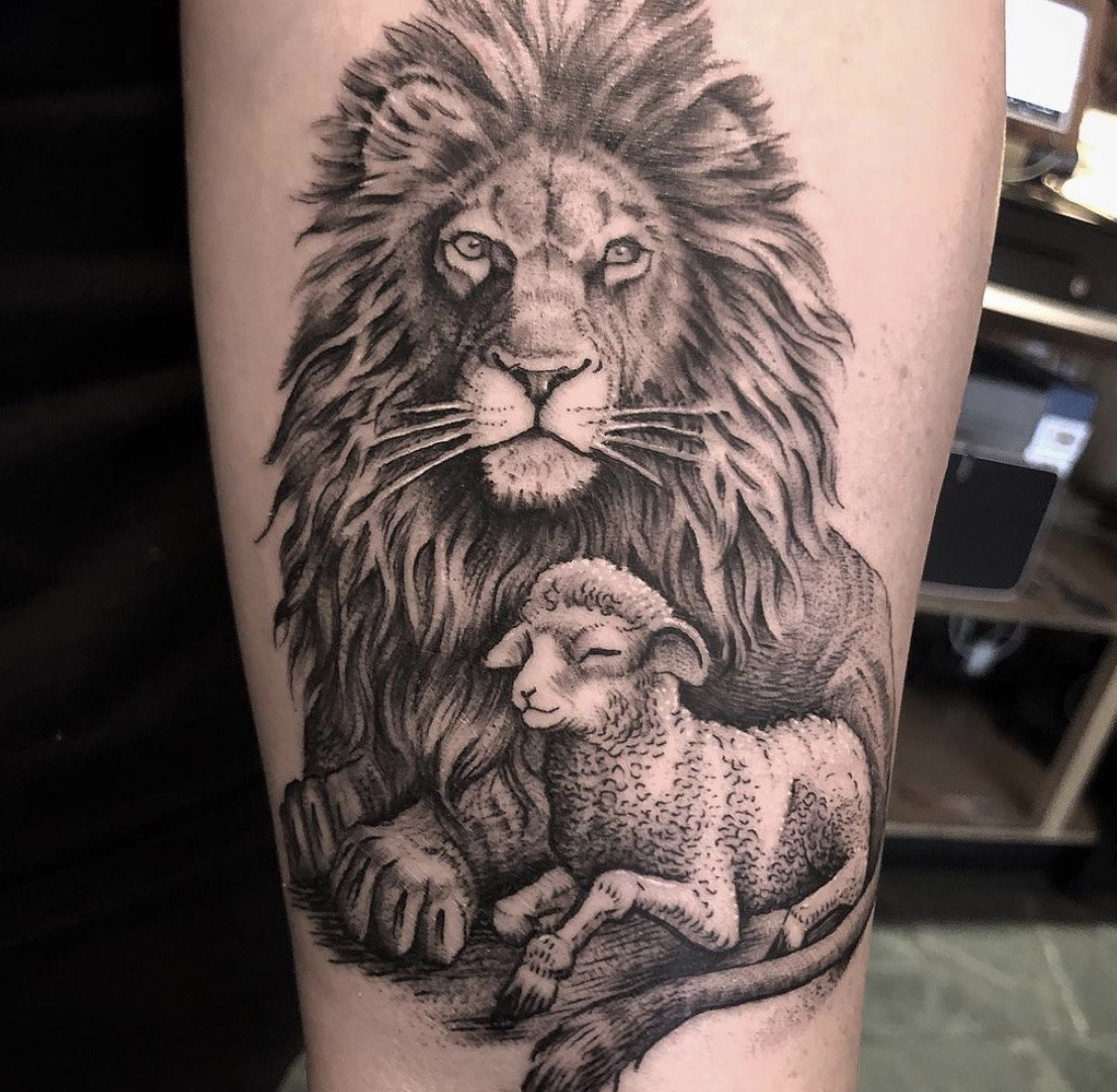 Lion and Lamb Tattoo on Arm