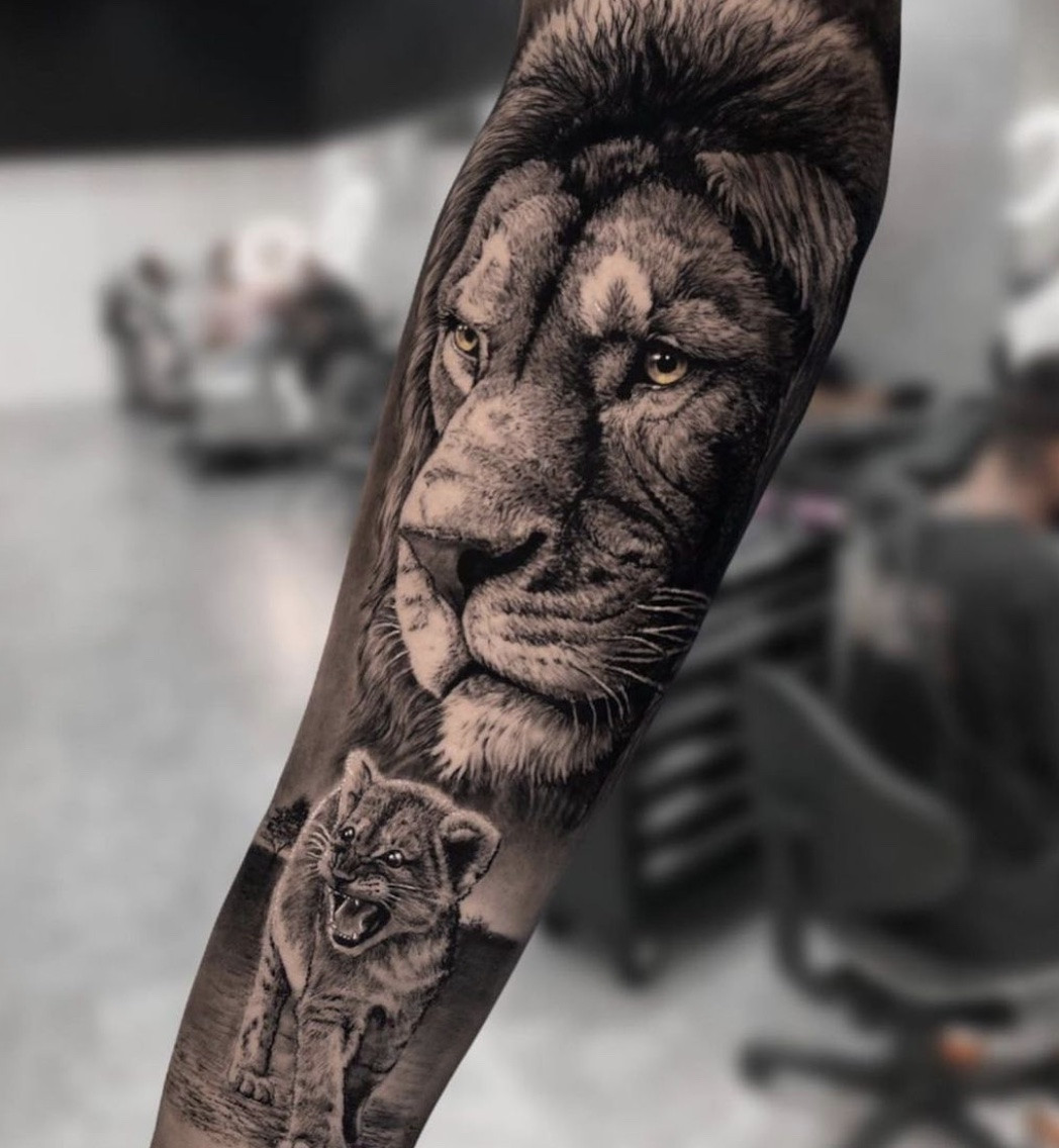 Lion Face Tattoo, full face portrait, majestic and detailed