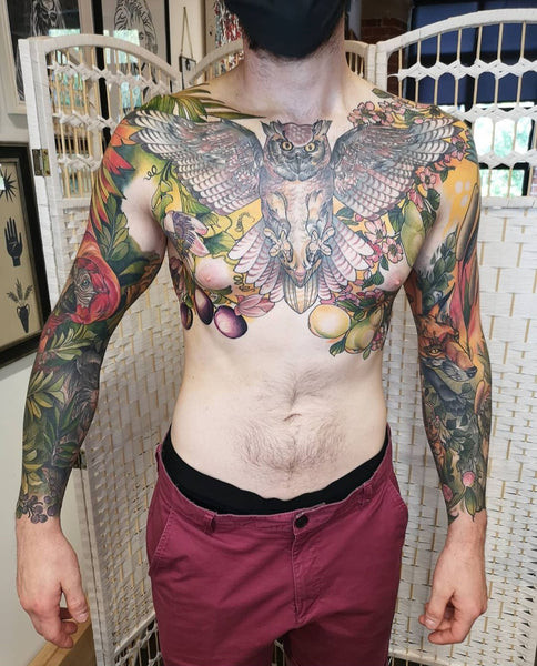 Full sleeve and chest tattoos by Lucy O'Connell