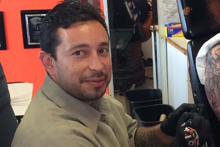 Manuel, tattoo artist at Speedway location