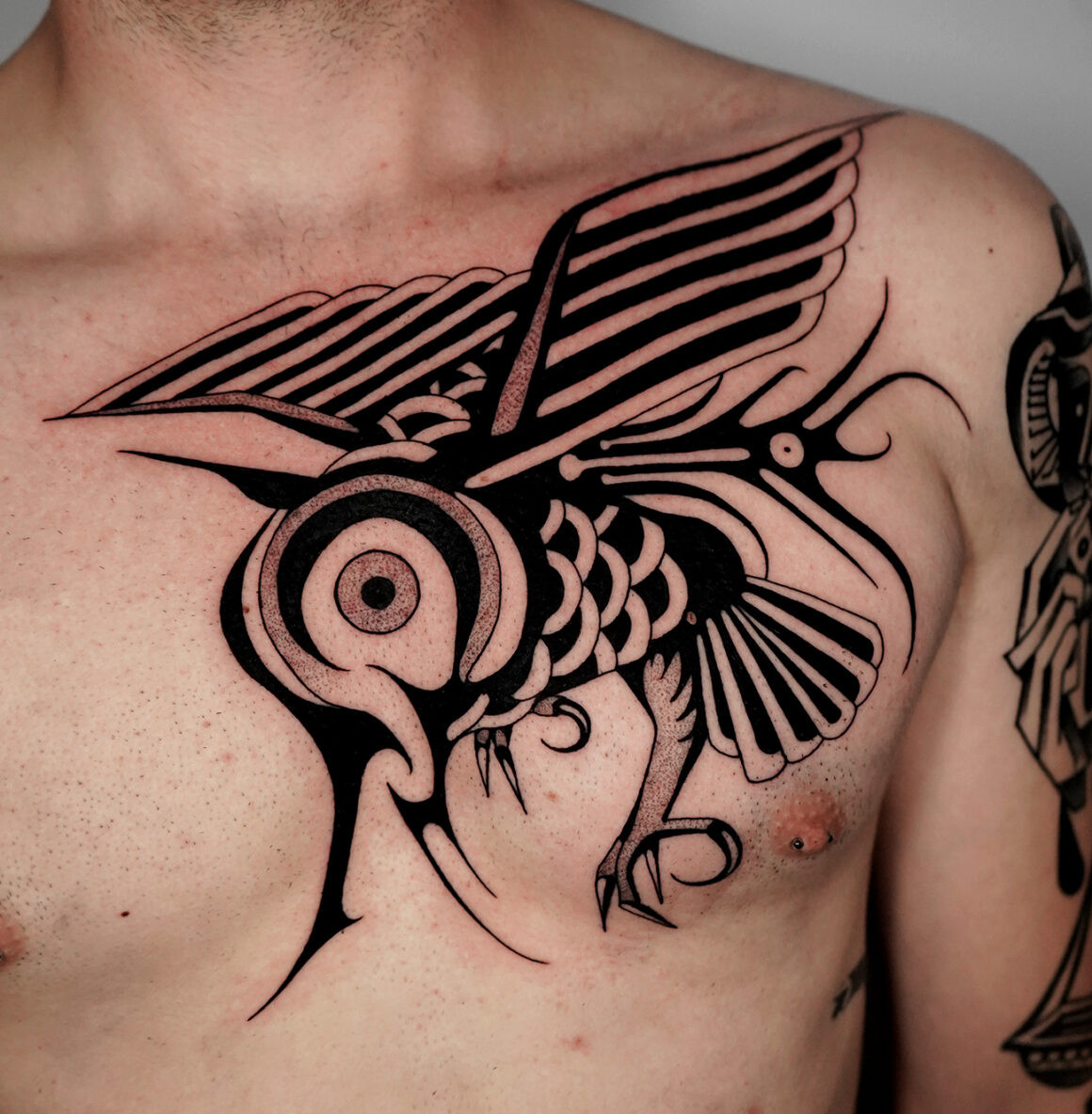 Example of Marco Gruschwitz's surrealism tattoo art, highlighting bold lines and surreal imagery.