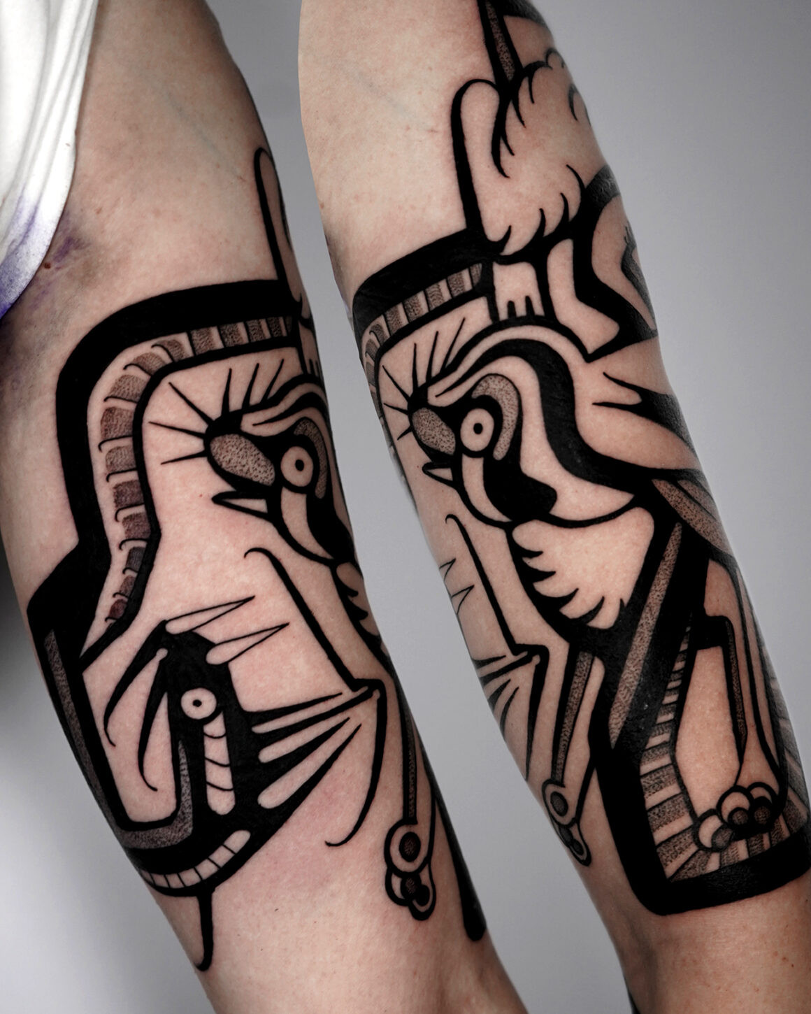 Marco Gruschwitz's tattoo work, demonstrating fine line details and surrealistic themes.