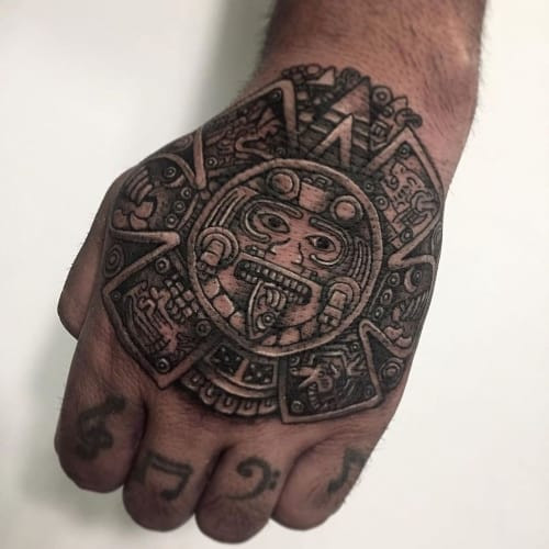 Mayan warrior tattoo sleeve, a bold and powerful men tattoo idea.