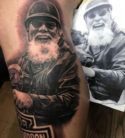 Memorial portrait tattoo on the arm, honoring a loved one in men tattoo ideas.