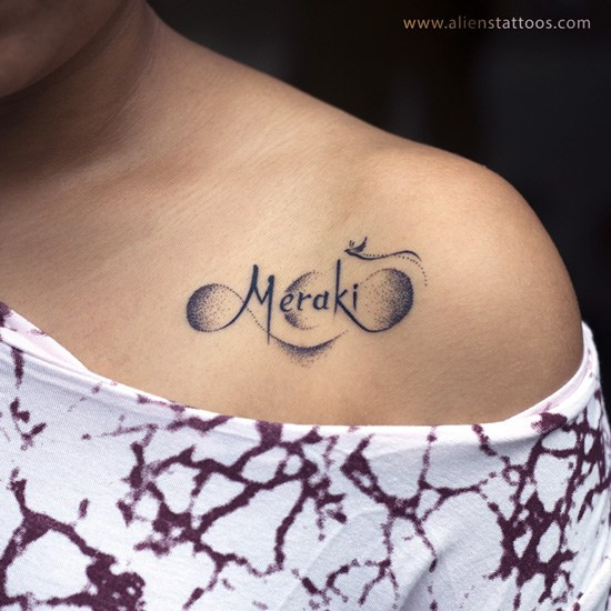 &quot;Meraki&quot; word tattoo on wrist in delicate script, representing passion and creativity