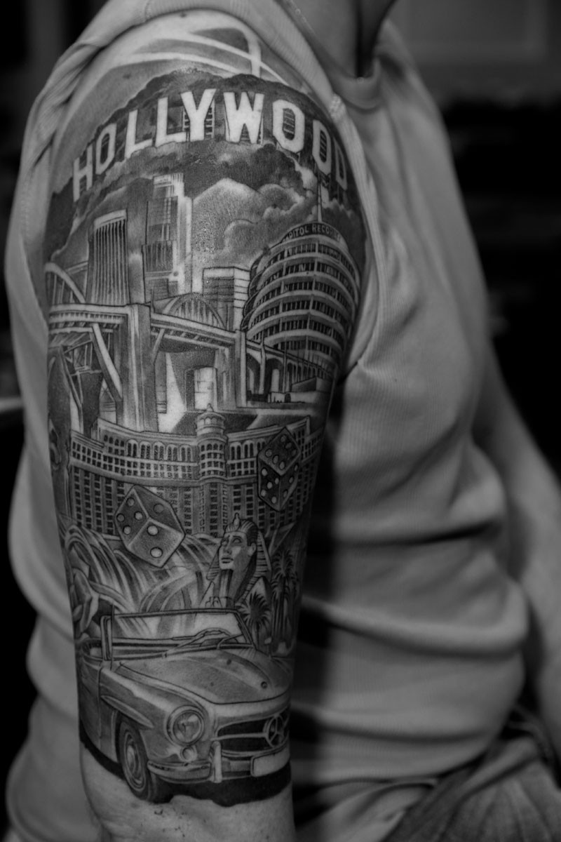 Hollywood sign tattoo on arm sleeve