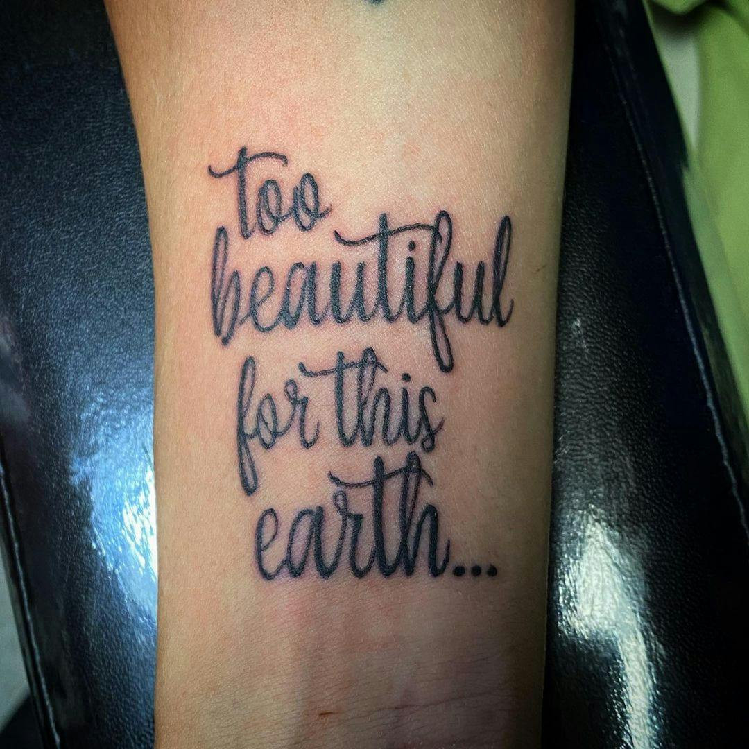 Too beautiful for earth quote miscarriage tattoo on forearm.