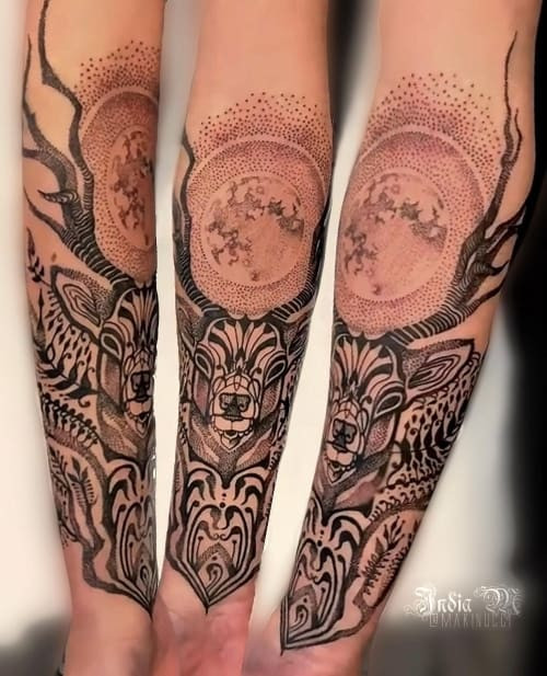 Two moon tattoos on men, one on the forearm with a realistic moon and stars and another on the arm with a minimalist moon phase design.