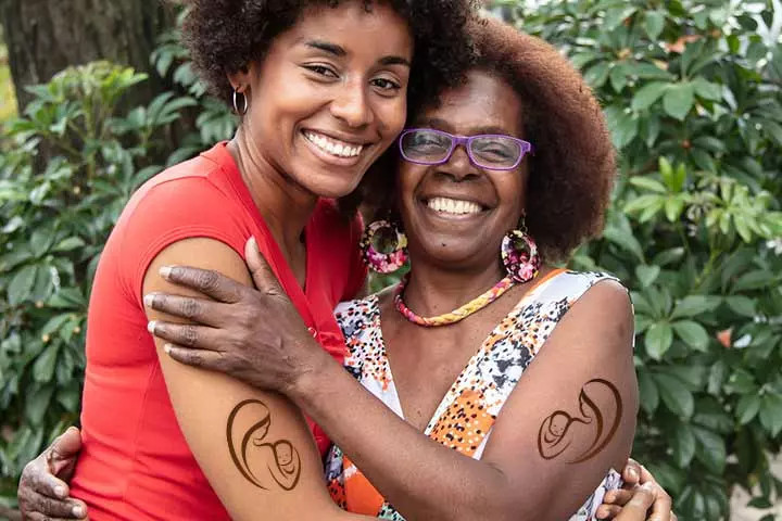 Mother-Daughter Hug Tattoo