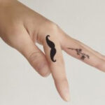 Regrettable mustache tattoo as a cautionary tale