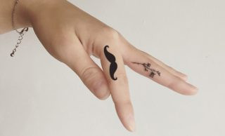 Regrettable mustache tattoo as a cautionary tale