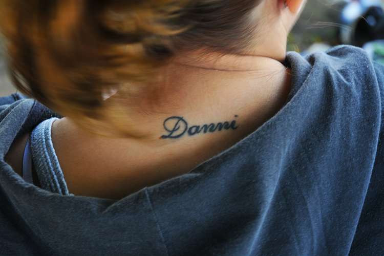 name tattoo on neck